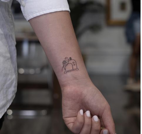 Piccolo tatuaggio macchina per cucire