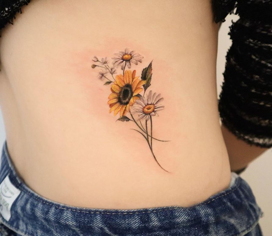 Girasoli e margherite tattoo anca