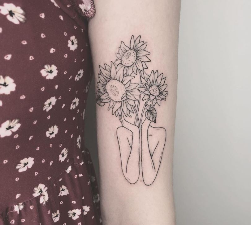 Tatuaggio testa di girasole