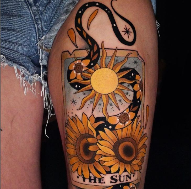 Tatuaggio girasole coscia
