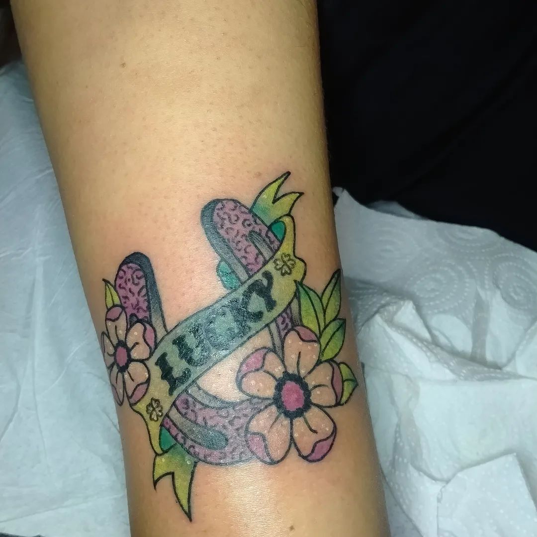 Ferro di cavallo tatuaggio portafortuna