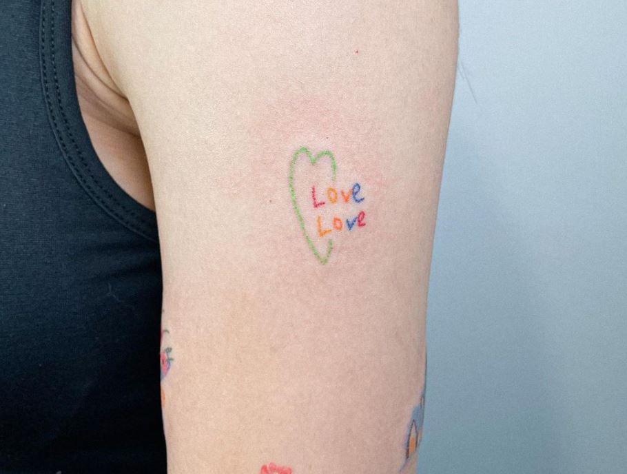 Scritta love love tattoo