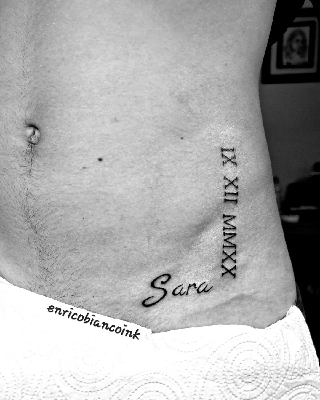 Tatuaggio numeri romani con nome