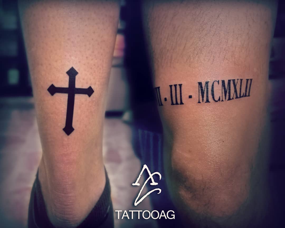 Tatuaggio numeri romani e croce