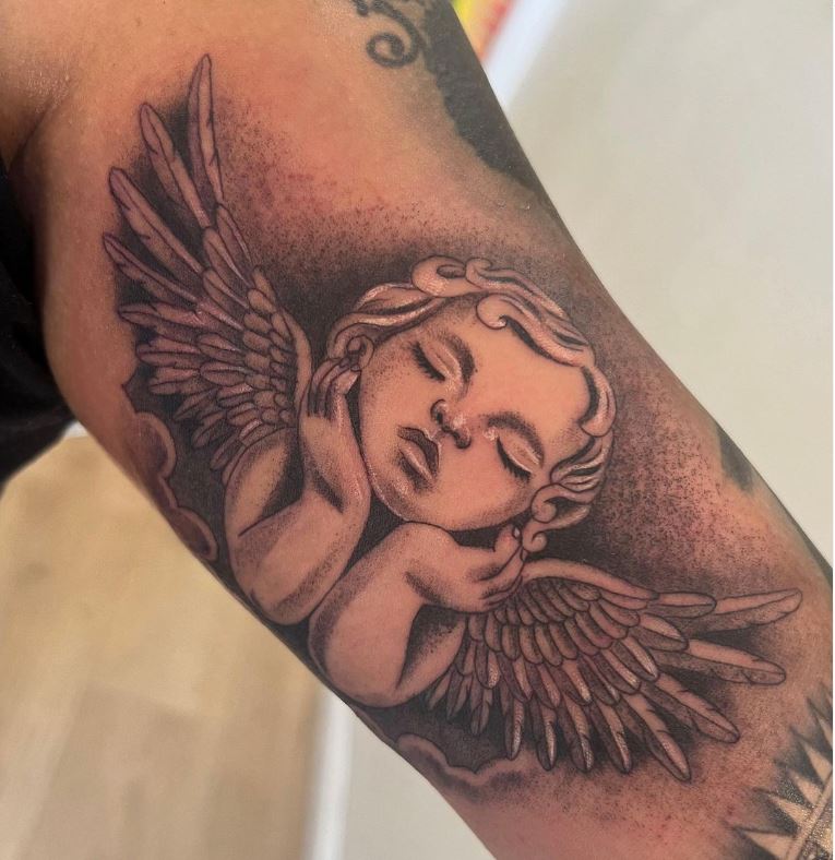 Angelo putto sul braccio